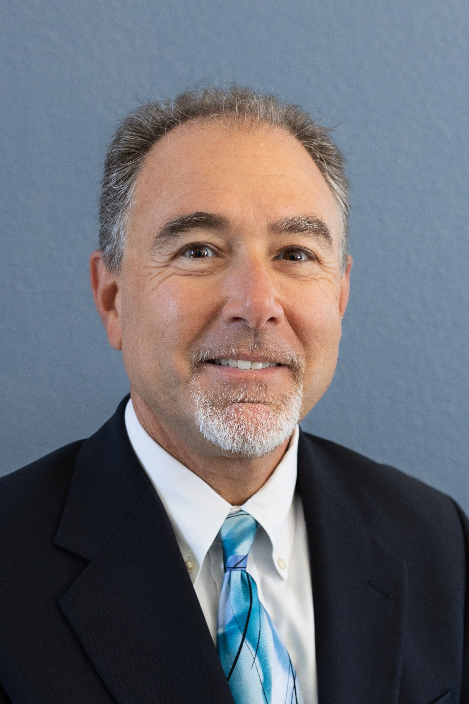 Portrait of Speaker Name